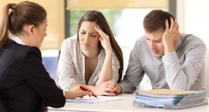 Image of a couple worried about estate planning. Contact Beaupre Law to get help with estate planning.